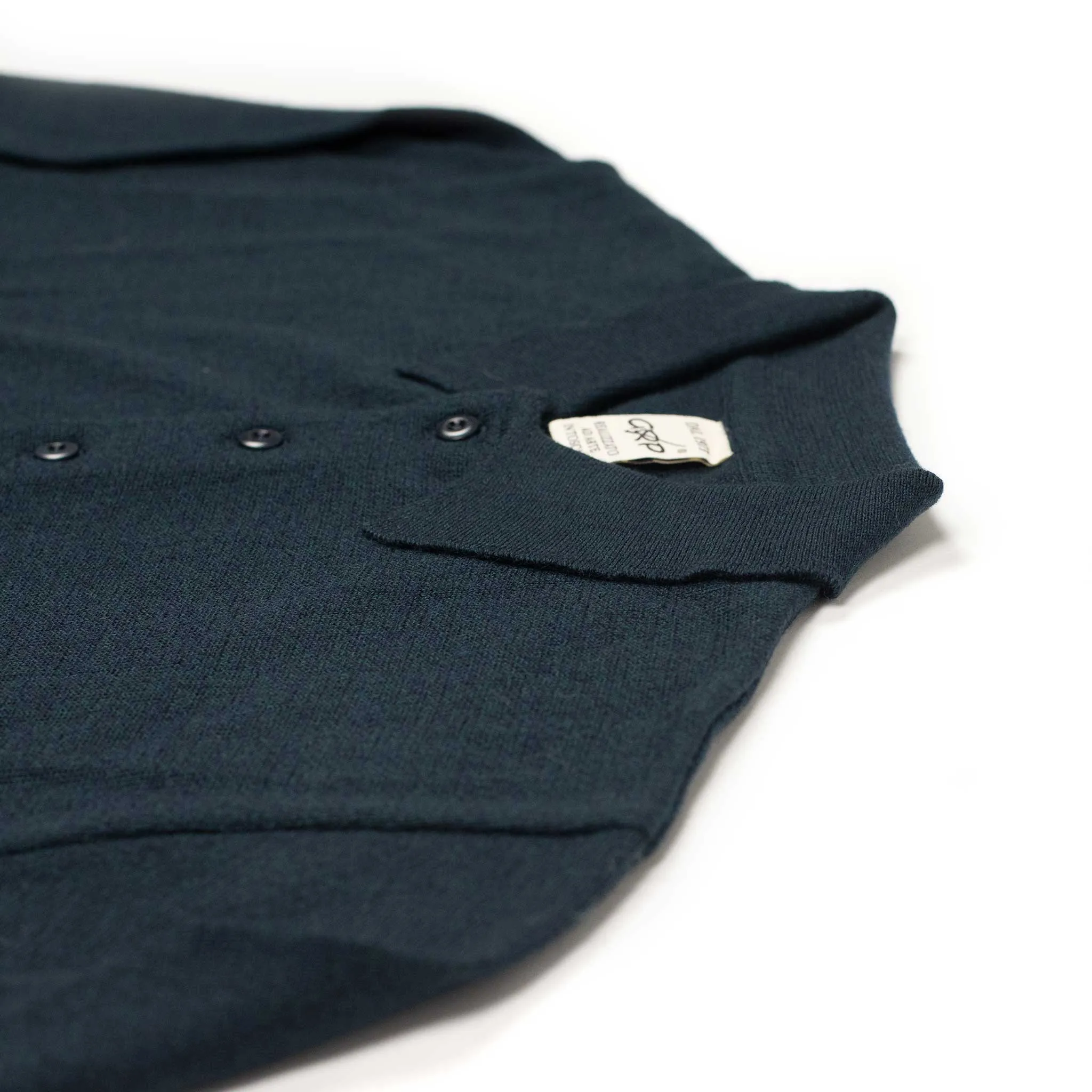 Knit long sleeve polo in petrol melange merino wool (restock)